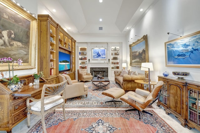 living area with ornamental molding, high vaulted ceiling, built in features, and a raised ceiling