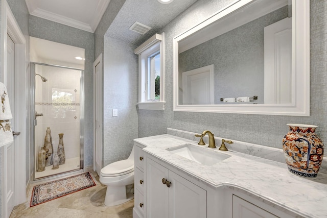 bathroom with vanity, crown molding, an enclosed shower, and toilet