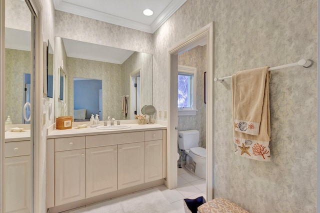 bathroom featuring toilet, tile patterned flooring, ornamental molding, and vanity