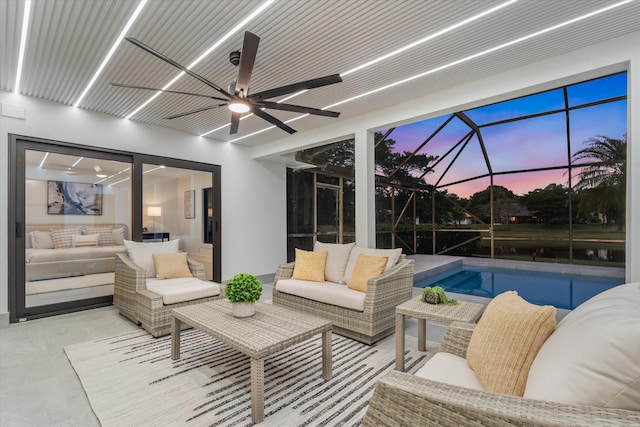 exterior space featuring glass enclosure, an outdoor living space, and ceiling fan