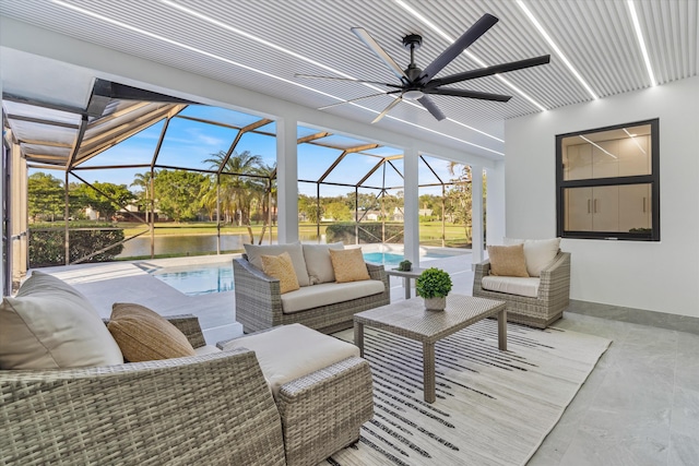 view of patio / terrace with outdoor lounge area, a lanai, and a water view