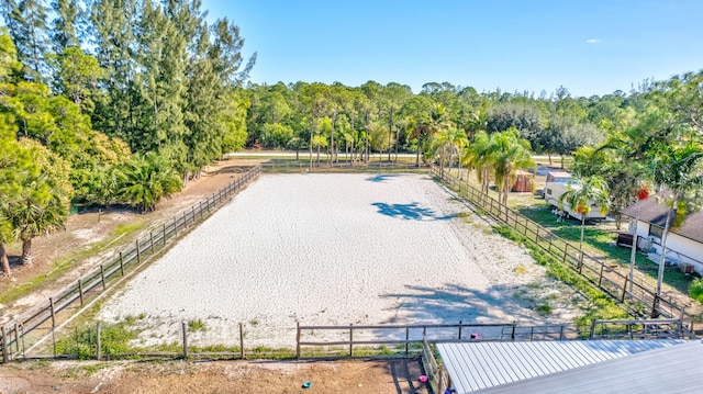 birds eye view of property featuring a rural view