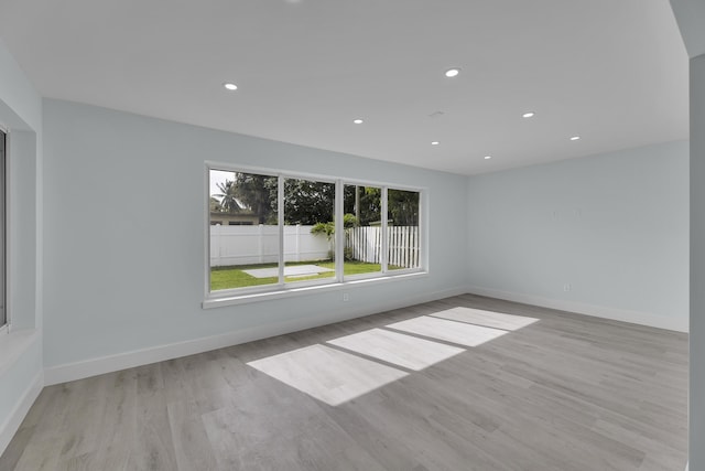 empty room with light wood-type flooring