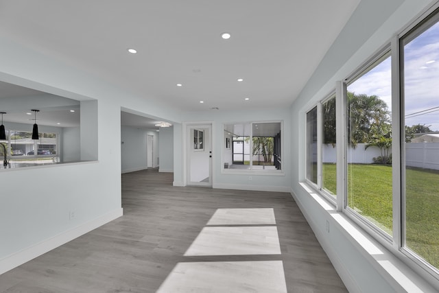 interior space featuring a wealth of natural light and light hardwood / wood-style floors