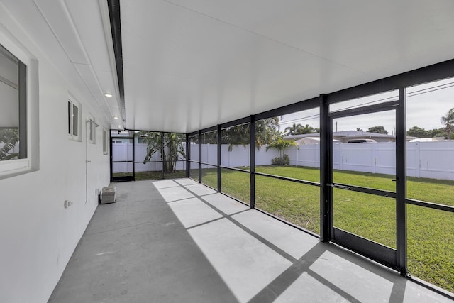 unfurnished sunroom with plenty of natural light