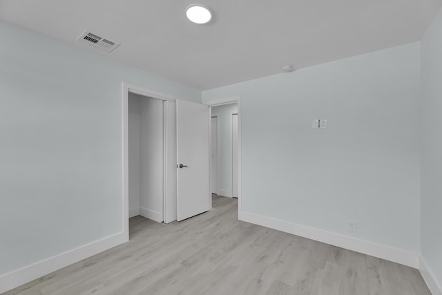 empty room featuring light hardwood / wood-style floors