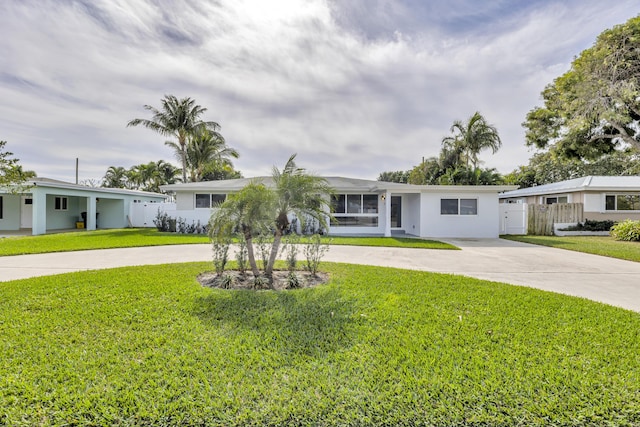 single story home featuring a front yard