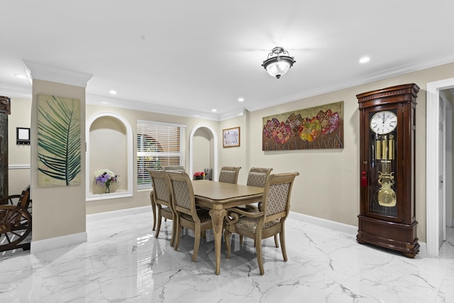 dining space featuring crown molding