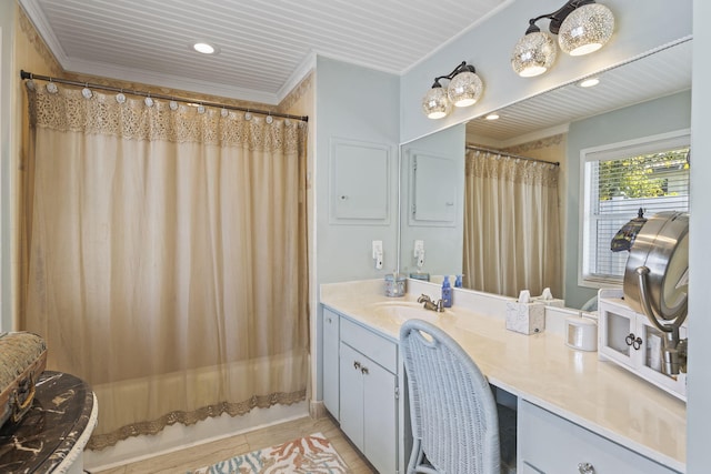 bathroom with ornamental molding, vanity, shower / bath combination with curtain, and tile patterned floors