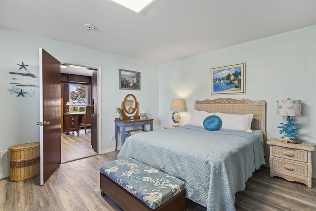 bedroom featuring hardwood / wood-style flooring