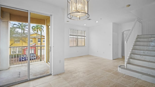 interior space with a chandelier