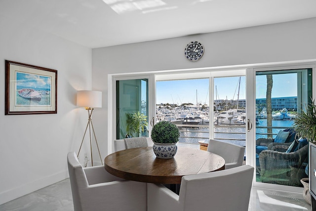 dining area with a water view