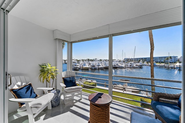 sunroom with a water view