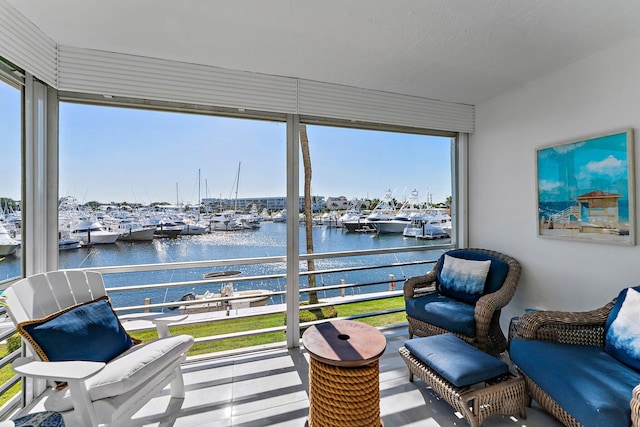 sunroom with a water view