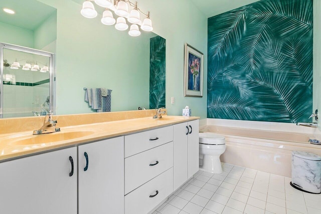 full bathroom featuring separate shower and tub, vanity, toilet, and tile patterned floors