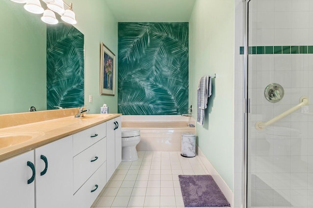 full bathroom with plus walk in shower, vanity, tile patterned floors, and toilet