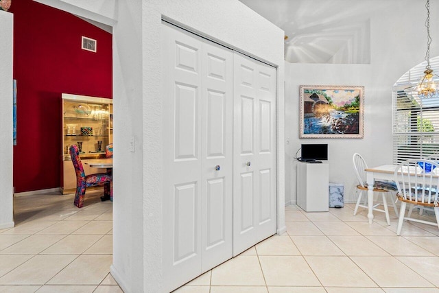 interior space featuring light tile patterned floors