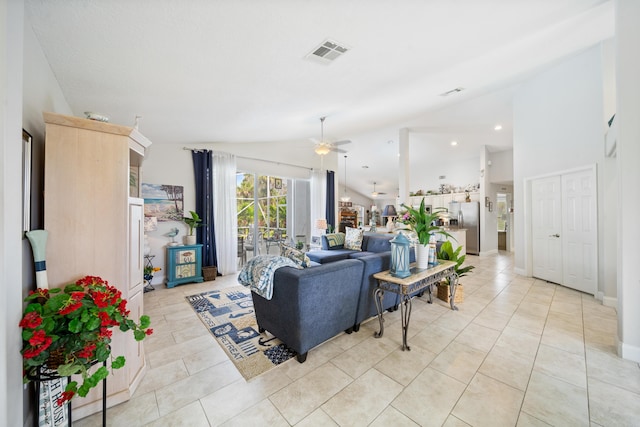 living room featuring light tile patterned floors, vaulted ceiling, and ceiling fan