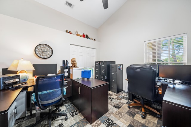 office space featuring ceiling fan and high vaulted ceiling