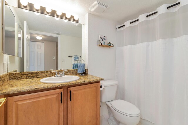 1801 N Flagler Dr Unit 840, West Palm Beach, FL 33407 - full bath featuring toilet, vanity, and a shower with shower curtain