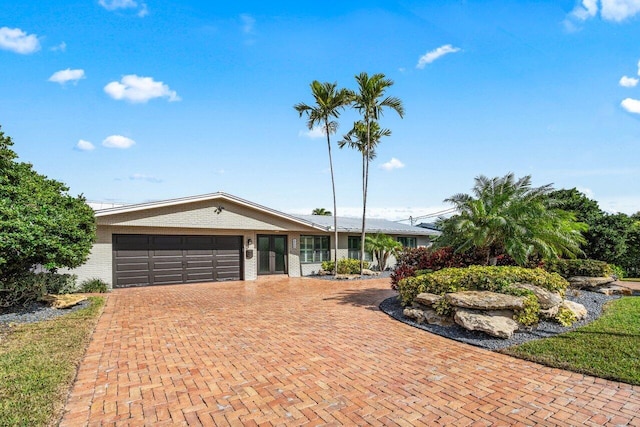 view of pool with area for grilling and a patio