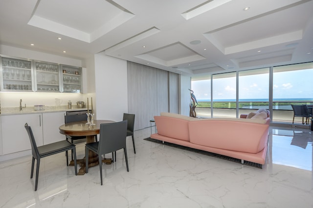 dining room with floor to ceiling windows and wet bar