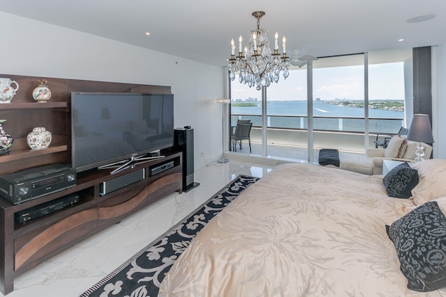 bedroom with floor to ceiling windows, access to exterior, and a chandelier