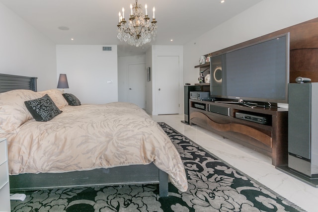 bedroom with a chandelier