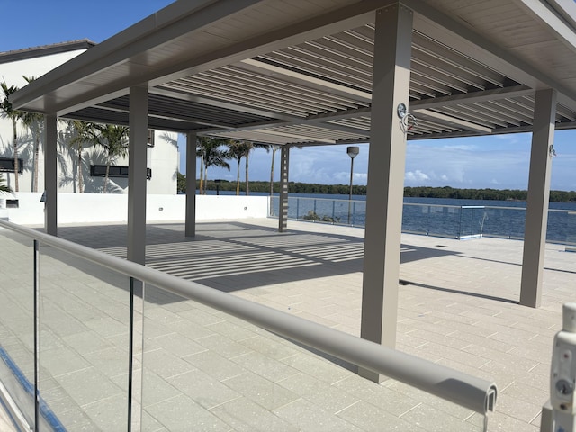 view of patio / terrace with a water view