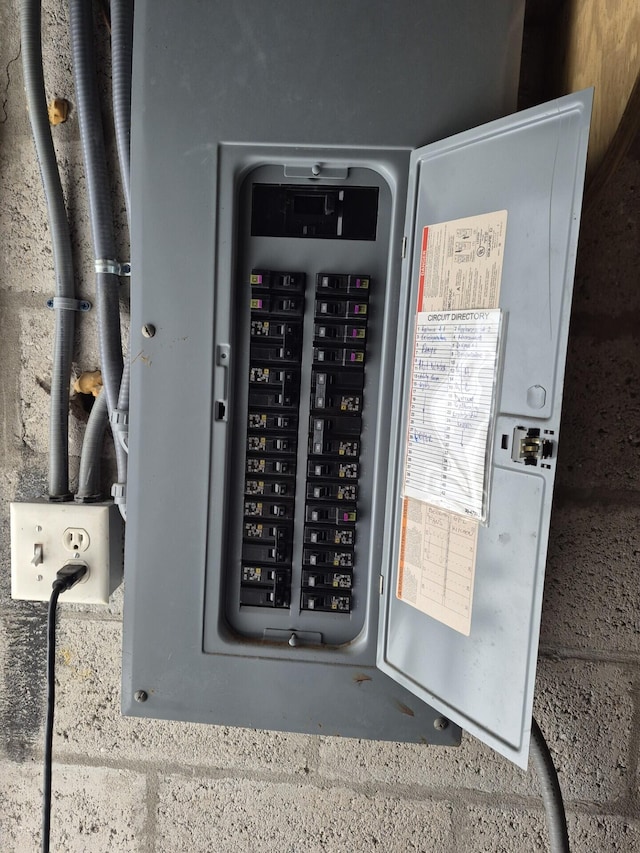 utility room with electric panel