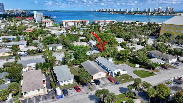 birds eye view of property featuring a water view