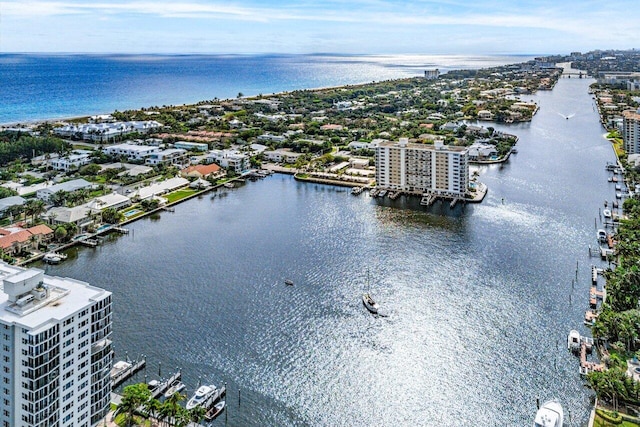 birds eye view of property featuring a water view