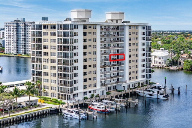 view of building exterior featuring a water view