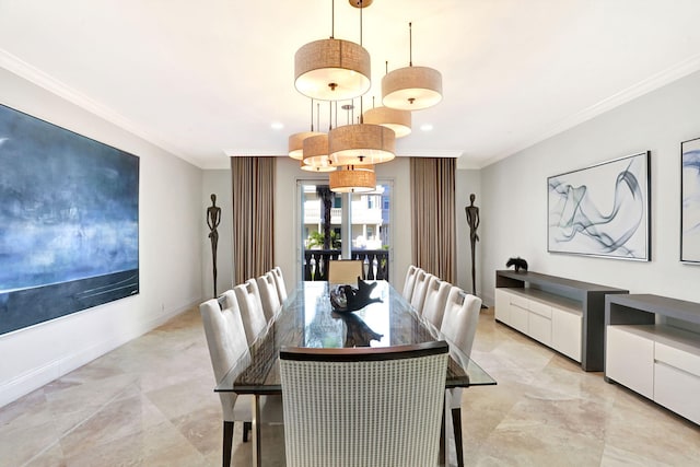 dining room featuring crown molding