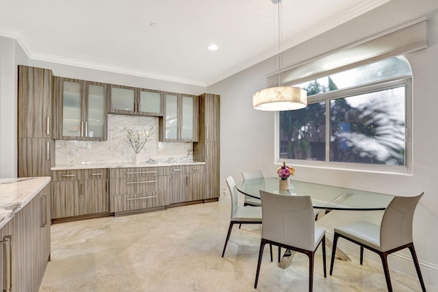 dining room with ornamental molding