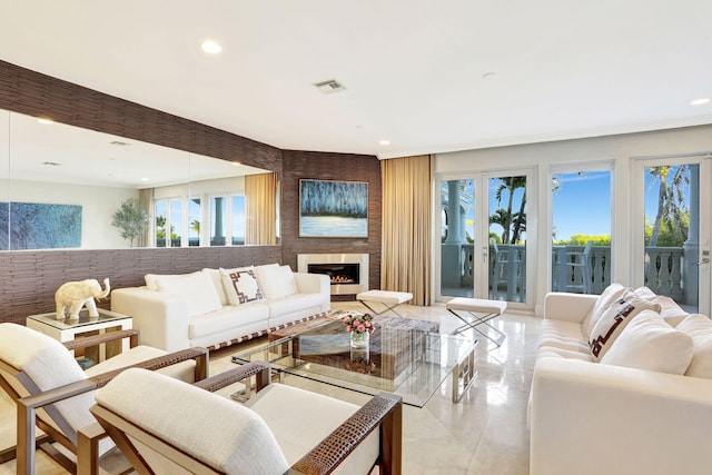 living room featuring a fireplace