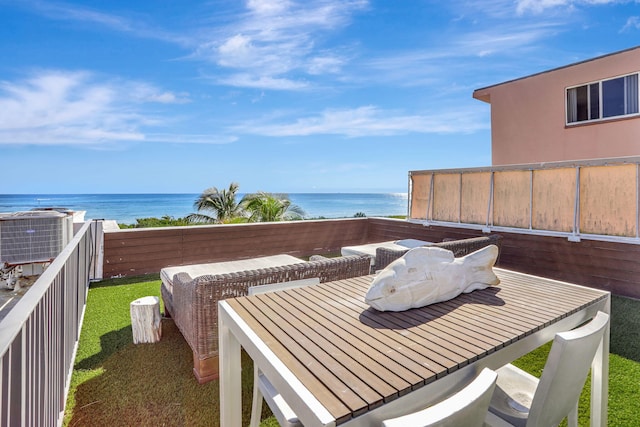 balcony with a water view and central air condition unit