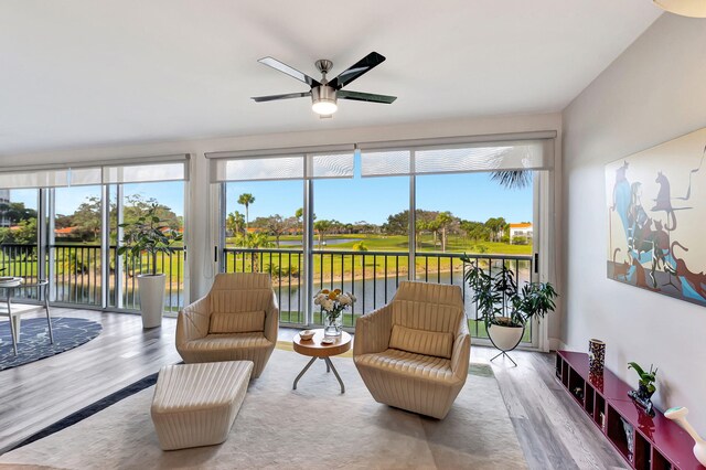 sunroom / solarium with ceiling fan