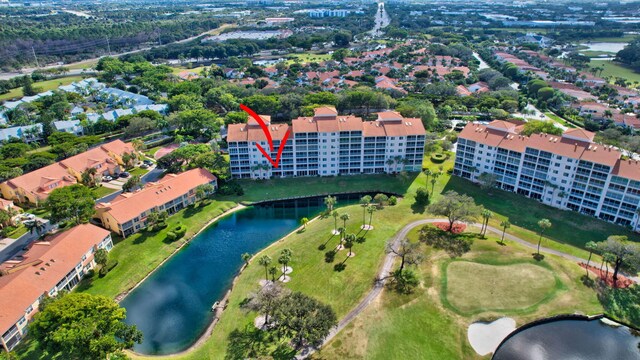 birds eye view of property featuring a water view