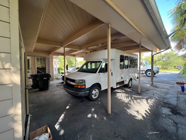 view of parking featuring a carport