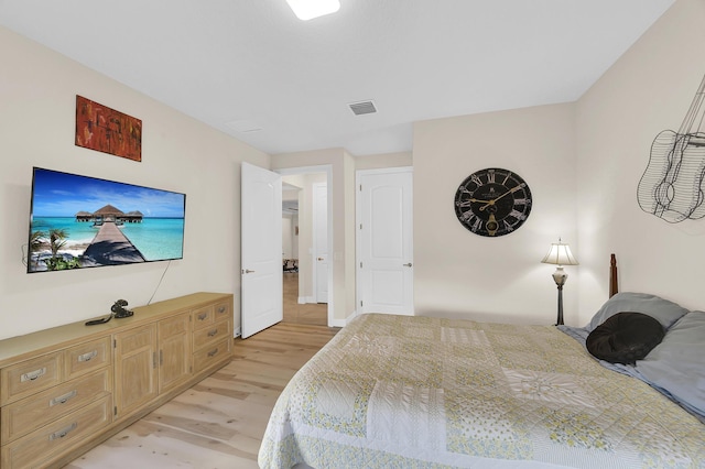 bedroom with light hardwood / wood-style flooring