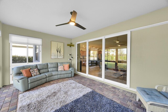 living room with ceiling fan