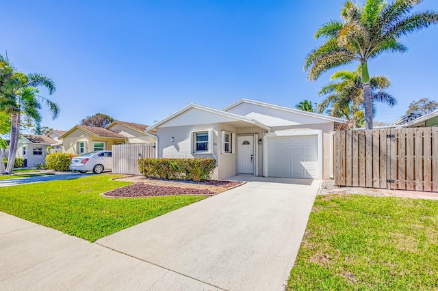 view of front of home with a garage and a front yard