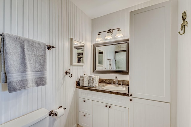 bathroom with vanity and toilet