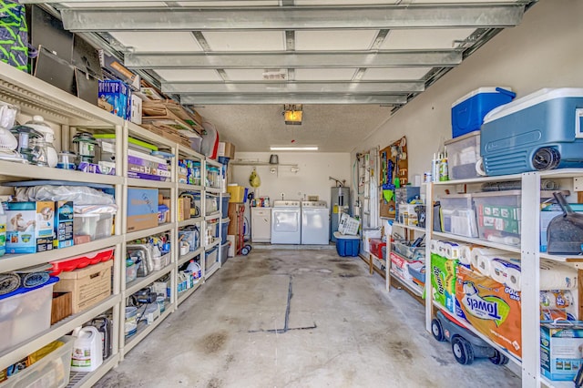 storage area with independent washer and dryer and water heater