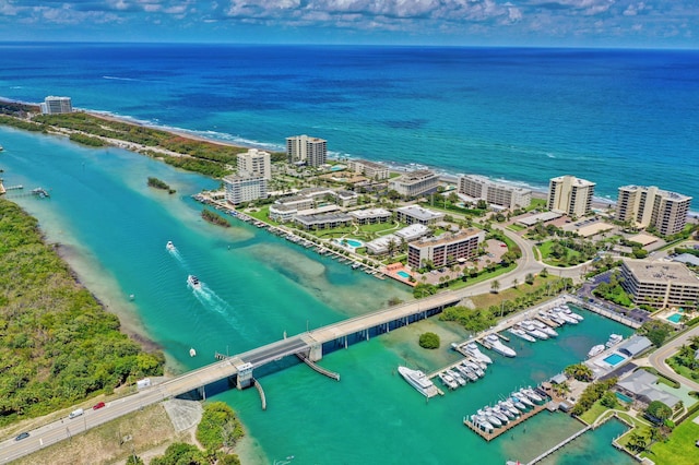 birds eye view of property featuring a water view