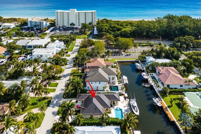 drone / aerial view with a water view