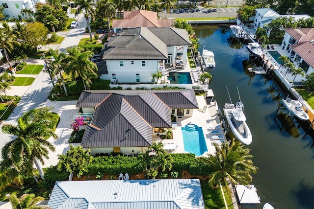 birds eye view of property featuring a water view