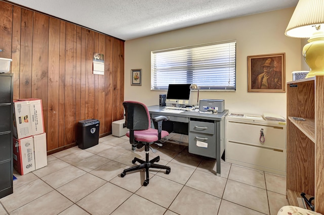 tiled office with a textured ceiling and wood walls