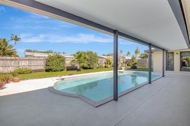 view of swimming pool with a patio